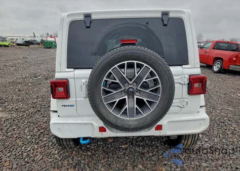 2023 Jeep Wrangler Sahara 4Xe from USA, damaged, VIN 1C4JJXP68PW505750